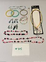 Overview of entire jewelry lot laid out