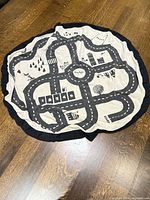 Top view showing road map print and drawstring edge