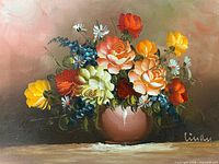 Full view of signed floral still life painting