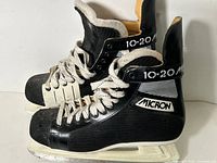 left side view of both Micron Mega 10-90 skates showing branding, size and overall condition