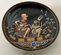 Front of plate showing Egyptian scene and gold rim