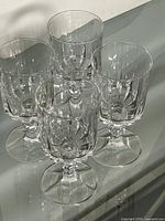 Top view showing all four crystal wine glasses