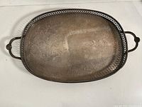Top view of entire silver-plated tray with handles