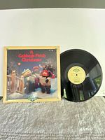 Front cover and vinyl record displayed
