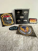 Group shot of all patches and badge case