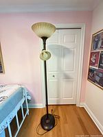 Full view of torchiere floor lamp with side reading light
