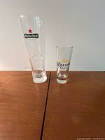 Heineken pilsner and Corona taster glass side by side