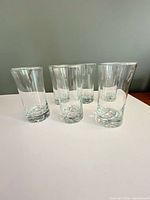 Front angled view of all six tumblers standing upright