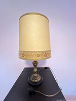 Full lamp view with shade illuminated