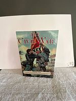 Front cover of one volume showing artwork and title