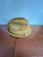 Front view of mustard tan wool felt fedora