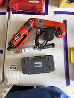 Cordless driver with charger, Master Mechanic bit set case, Diablo auger bit