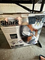 Front of Shark Portable Steam Pocket box showing product details