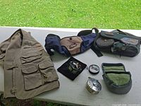 Overview showing vest, both bags, both reels with pouches