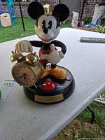 Full view of Mickey Mouse talking alarm clock on table