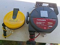 Front view showing both retractable cord reels side by side