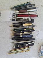 Top view of all 24 pens stacked to show quantity and variety