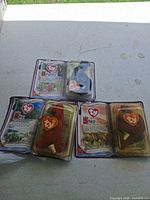 Group shot of three sealed Ty Dinosaur Trio packages