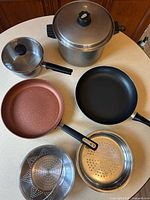 Top view all cookware items on countertop
