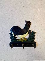 Front view of painted rooster wall hook plaque