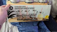 Front of boxed Hometrends 19-piece drink caddy set showing jars, caddy and lemon drink image