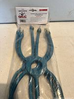 Front view of sealed package showing QCCANADA branding and part 0216 label