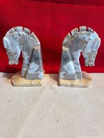 Front view of both quartz horse head bookends