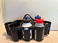 Full view of carrier with four water bottles inserted