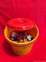 open bucket showing toys inside