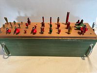 Top view showing all router bits arranged in wood block