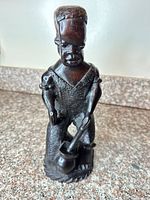 Front view of carved ebony figurine
