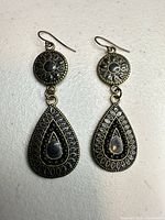 Full view of both earrings front side showing design and length