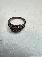 front view of ring showing CZ cluster and marcasite detailing