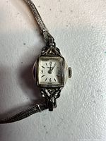 Front view showing dial, lugs and bracelet