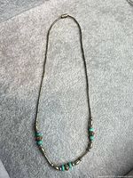 Full view of necklace showing length and bead arrangement