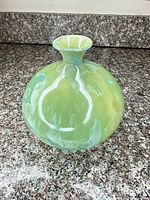 front view of light green crystalline glaze vase