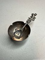 Top view of sterling bowl with spoon inside