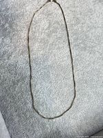 Full view of sterling silver box chain laid flat