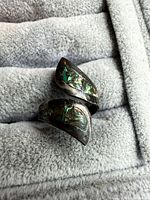 Front view showing abalone shell inlay and wrap design