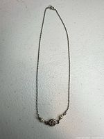 Full view of sterling silver necklace laid flat