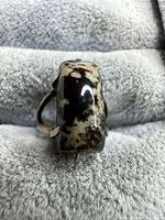 Top view showing cabochon coloration and setting