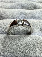 Full view of ring front showing tension setting and cubic zirconia