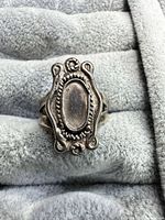 Front view showing ornate bezel and overall design