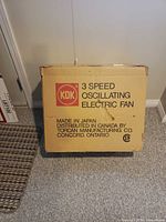 Front panel of KDK fan box showing branding and product details
