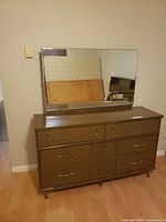Dresser with mirror attached, front view
