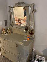 Full view of dresser with mirror attached, showing drawers, pulls, and colour