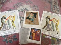 Group shot of all four prints plus certificate