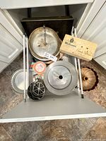 Drawer view of assorted baking pans and accessories