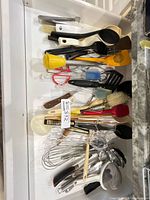 Drawer with assorted utensils, overview