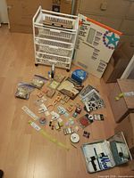 overall lot with cart, cutting center box and craft items spread on floor